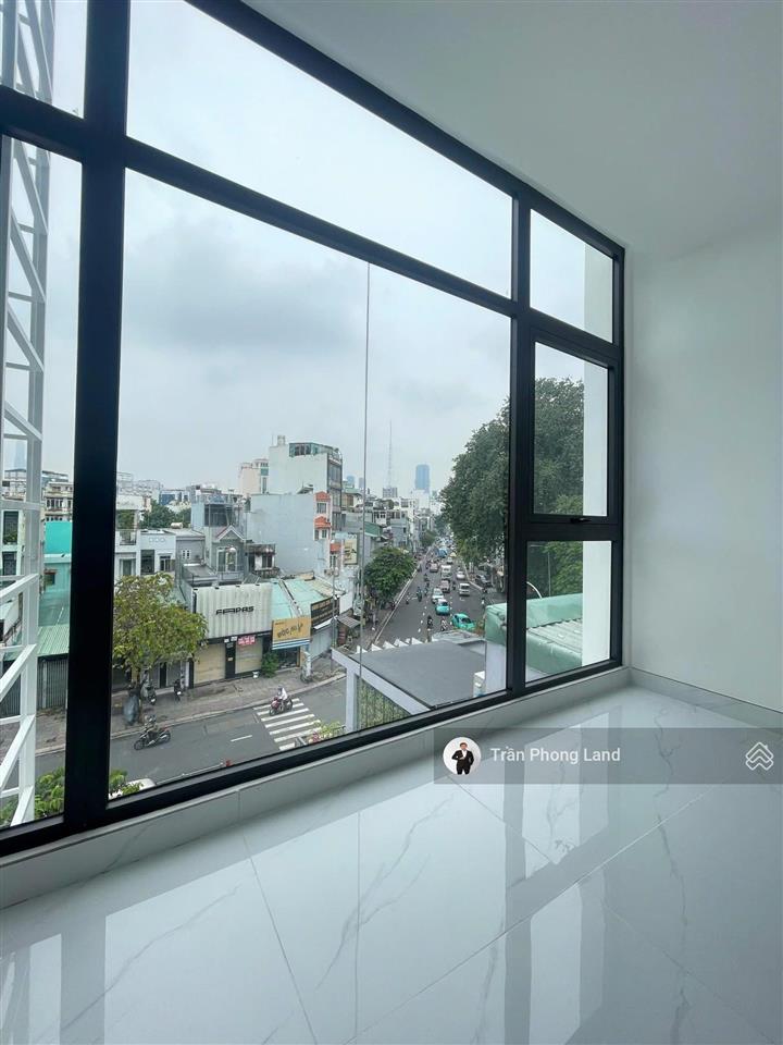 Chính chủ cho thuê nhà mặt tiền 205 đinh tiên hoàng, q1, 4.5x20m, trệt 5 lầu tm, 0908 140 ***