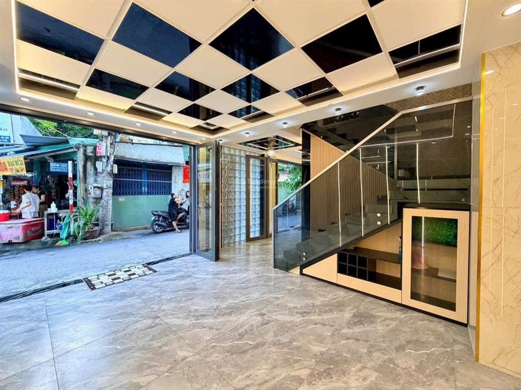 Mặt tiền hẻm thông ngay trực ale văn thọ sát bên đường quag trung dt 9 x5,5 trệt 4 lầu giá hơn 8 tỷ
