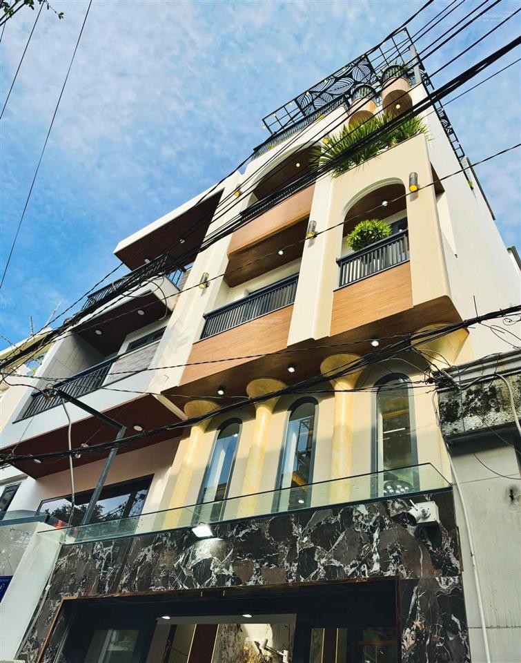 Nhà xây mới đường phạm văn chiêu dt 4x16m trệt lửng 3 lầu có thang máy 4 phòng ngủ hẻm ôtô 8.5 tỷ