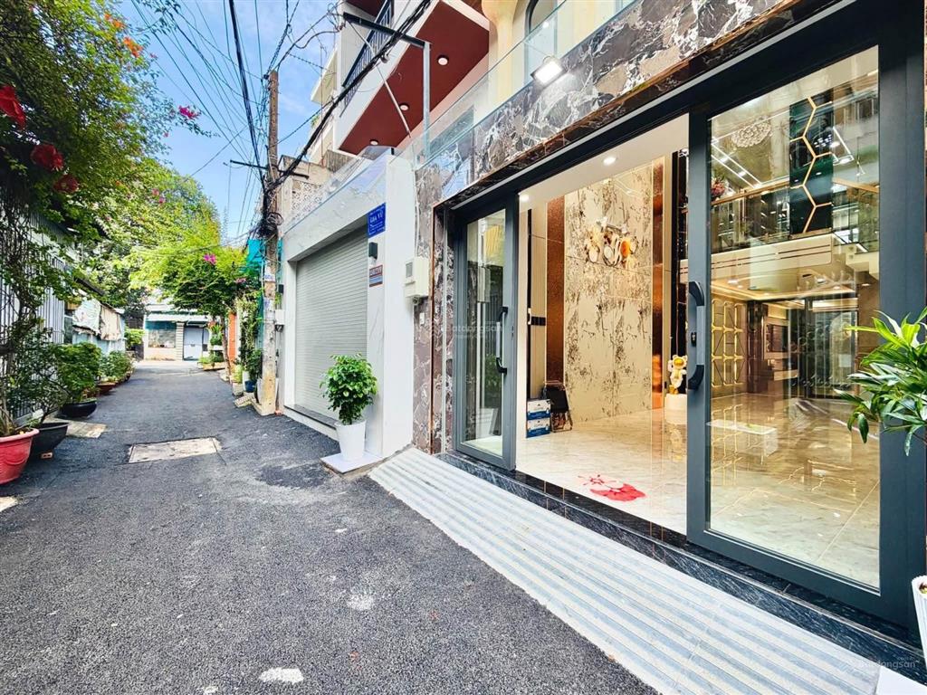 Nhà xây mới đường phạm văn chiêu dt 4x16m trệt lửng 3 lầu có thang máy 4 phòng ngủ hẻm ôtô 8.5 tỷ