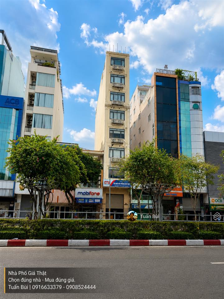 Tòa nhà vp mt hoàng diệu  150m tới bến nhà rồng, sát nguyễn tất thành mở rộng  vỉa hè 10m