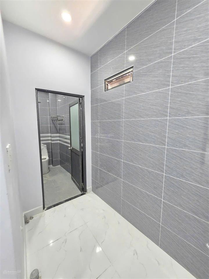 Bán nhà riêng ngay cầu phú long  trạm thu phí lái thiêu quốc lộ 13  84m2 ngang 5m xe ô tô vào nhà