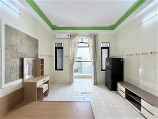 Mới 100% căn hộ tách bếp có ban công  cửa sổ thoáng fullnt gần phan xích long, phan đăng lưu