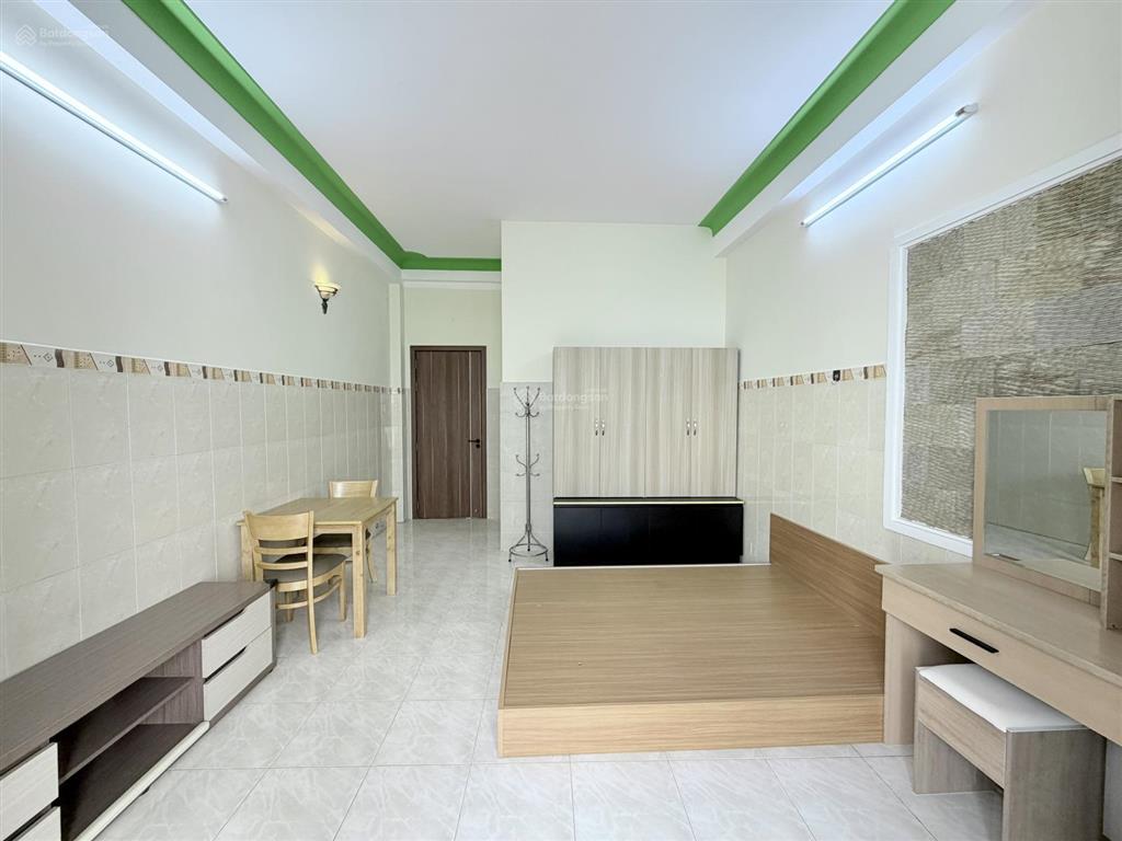 Mới 100% căn hộ tách bếp có ban công  cửa sổ thoáng fullnt gần phan xích long, phan đăng lưu