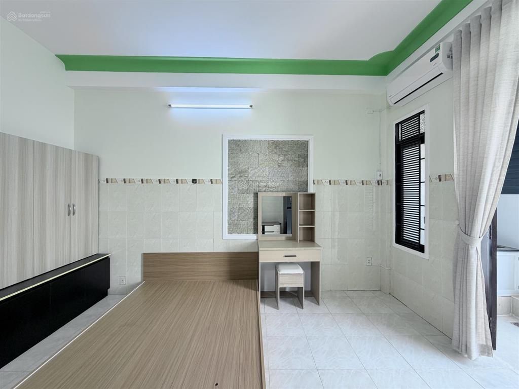 Mới 100% căn hộ tách bếp có ban công  cửa sổ thoáng fullnt gần phan xích long, phan đăng lưu