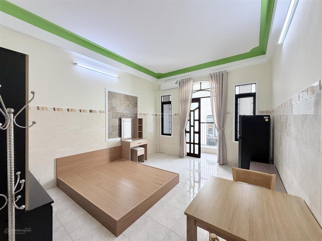 Mới 100% căn hộ tách bếp có ban công  cửa sổ thoáng fullnt gần phan xích long, phan đăng lưu