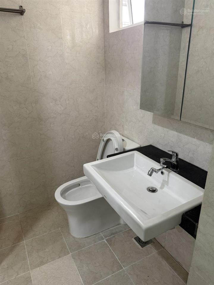 Bán căn hộ 91 phạm văn hai, gần sân bay, 65m, 2 phòng ngủ, 2 wc, sổ hồng, giá 5 tỷ. tuấn 0901 499 ***