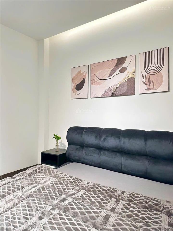 Bán nhà hẻm 8m khu đồng bộ lê văn quới. gần ngã tư bốn xã gia 8 ty hơn xíu xây 5 tầng dt 4x16m .