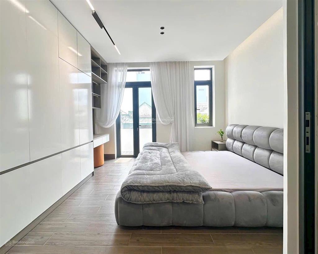 Bán nhà hẻm 8m khu đồng bộ lê văn quới. gần ngã tư bốn xã gia 8 ty hơn xíu xây 5 tầng dt 4x16m .