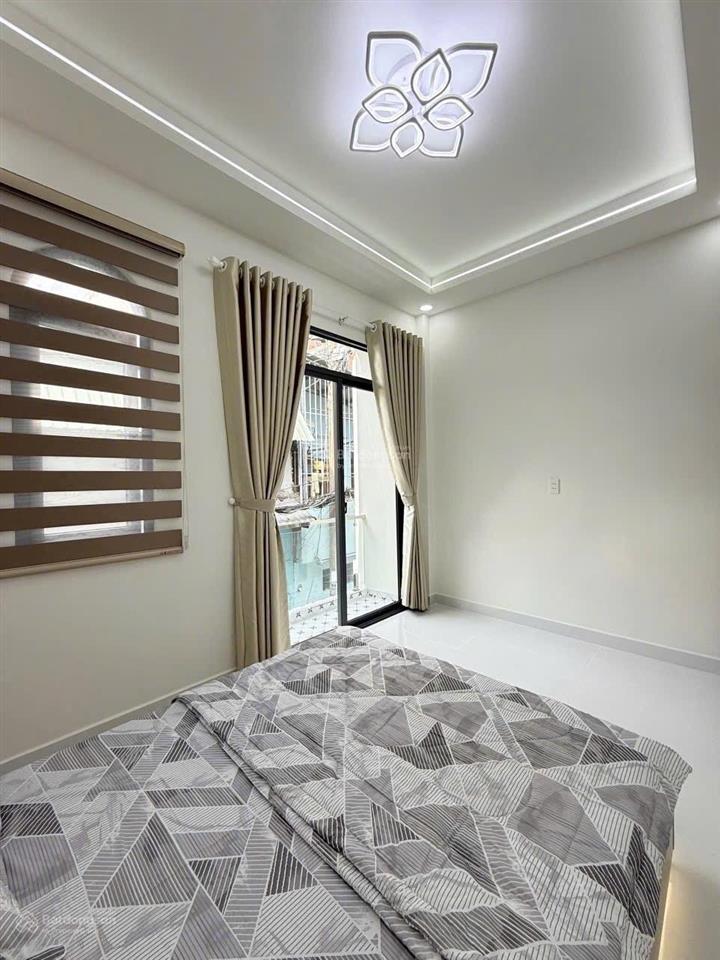 Bán nhà hxh ngay đối diện đầm xe 3pn 2wc nhà mới giáp q10 q11