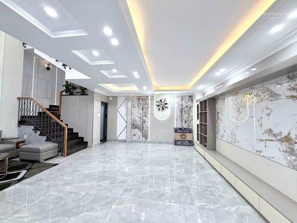 Nhà mới đẹp, hẻm xe hơi, quang trung  5 tầng  ngang 7m  gần emart, chợ cầu