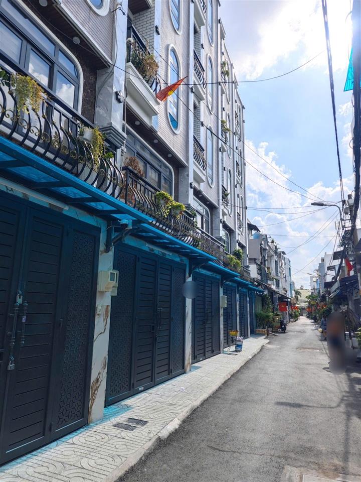 Nhà đẹp, 6 tầng, thang máy, hẻm 7m thông, ngay emart phan huy ích.
