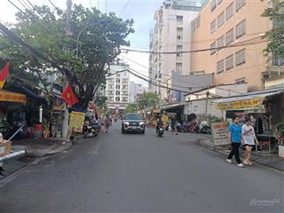 Khách sạn 6 tầng mặt tiền đường lý phục man quận 7, kdbb sầm uất. 6*20 giá 23 tỷ.