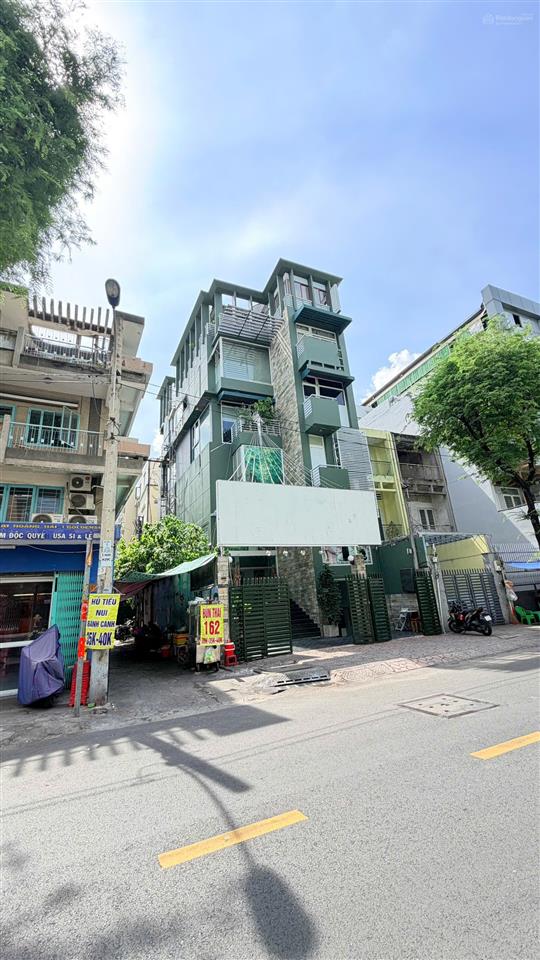 Bán gấp tòa nhà 6x22m7 tầng  mt nguyễn duy dương (góc ngô gia tự)