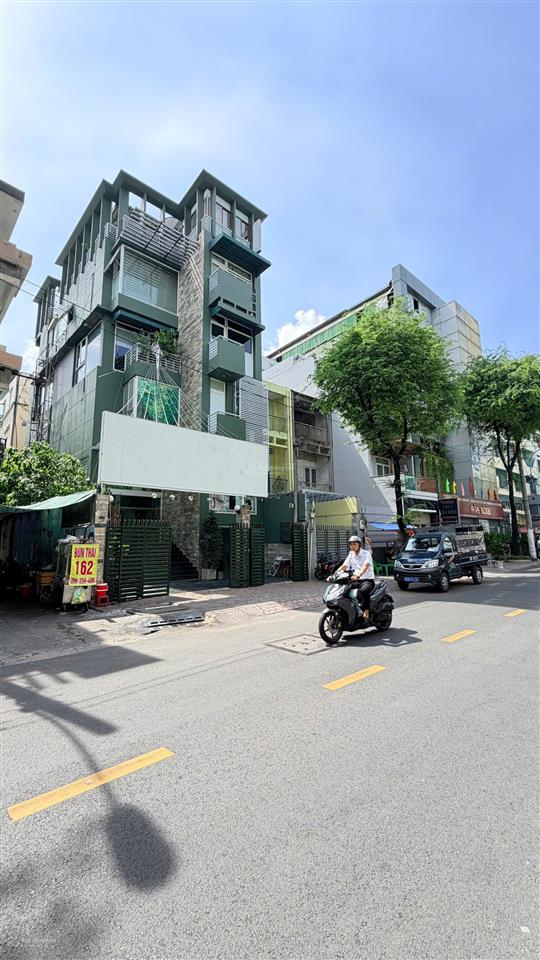 Bán gấp tòa nhà 6x22m7 tầng  mt nguyễn duy dương (góc ngô gia tự)