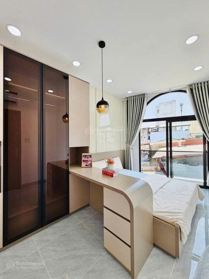 Bán nhà xây mới hẻm xe hơi sát mt đường phạm văn chiêu, p.13, 6 x 6, 3 tầng giá 5.39 tỷ tl