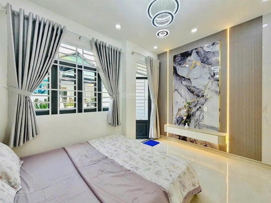 Bán nhà xây mới hẻm 6m 2 xe hơi tránh nhau đường lê đức thọ, p.13, 4 x 12, giá 7.38 tỷ tl