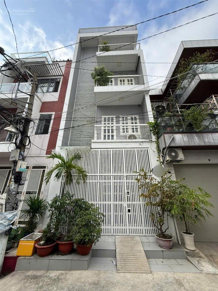 Bán nhà mới đẹp hẻm xe hơi 6m thông bàn cờ đường phạm văn chiêu, p.14, 5 x 9, 4 tầng giá 6.45 tỷ tl