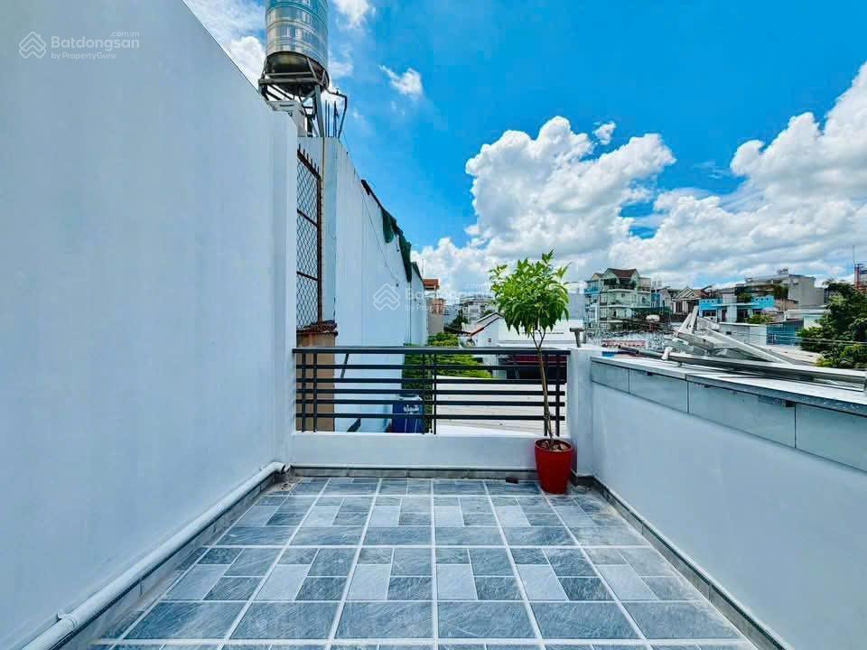 Bán nhà mới đẹp ngay chợ an nhơn hẻm xe hơi đường số 28, p.6, 5.1 x 16, 4pn giá 6.75 tỷ tl