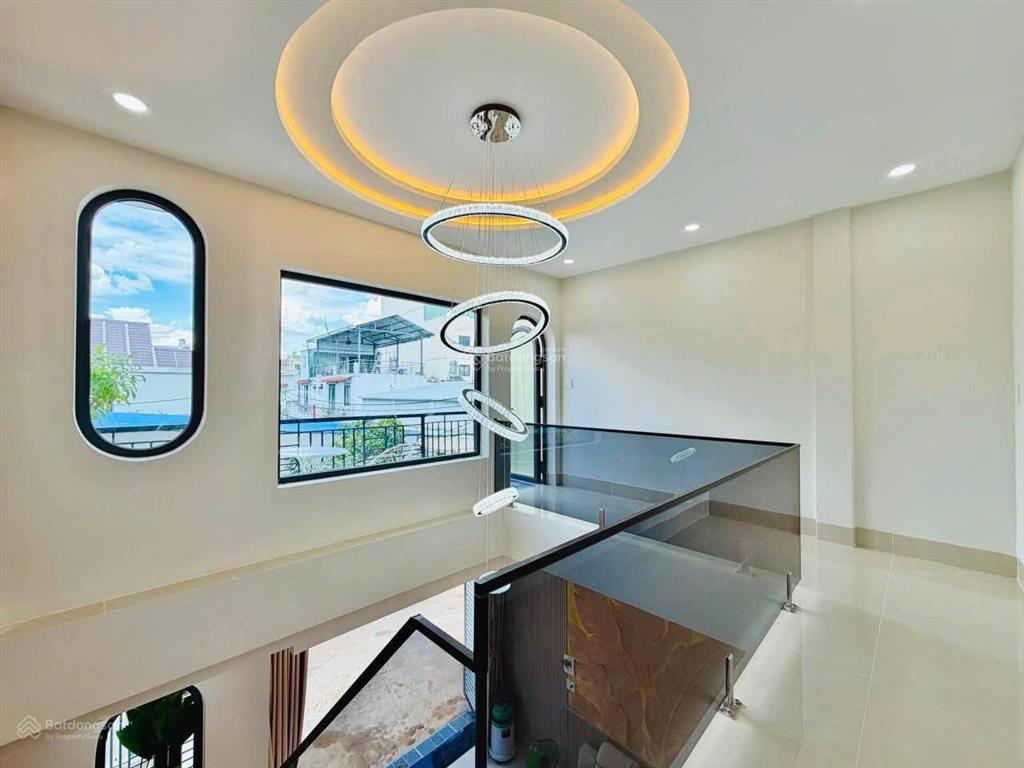 Bán nhà mới đẹp ngay chợ an nhơn hẻm xe hơi đường số 28, p.6, 5.1 x 16, 4pn giá 6.75 tỷ tl