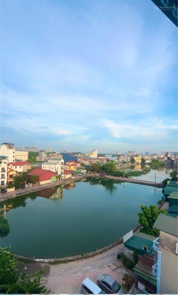 Bán nhà cự khối xây mới  lô góc  view hồ 7 tầng thang máy, thoáng mát vĩnh viễn 140m2 21.5 tỷ