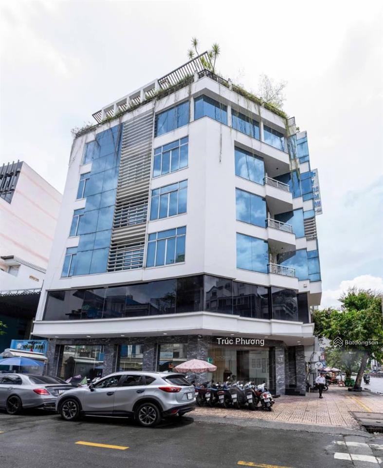 Building đẹp góc 2mt trần hưng đạo quận 1, 180m2(10x18)m trệt2 lầu, hđt 230 triệu, giá 61 tỷ