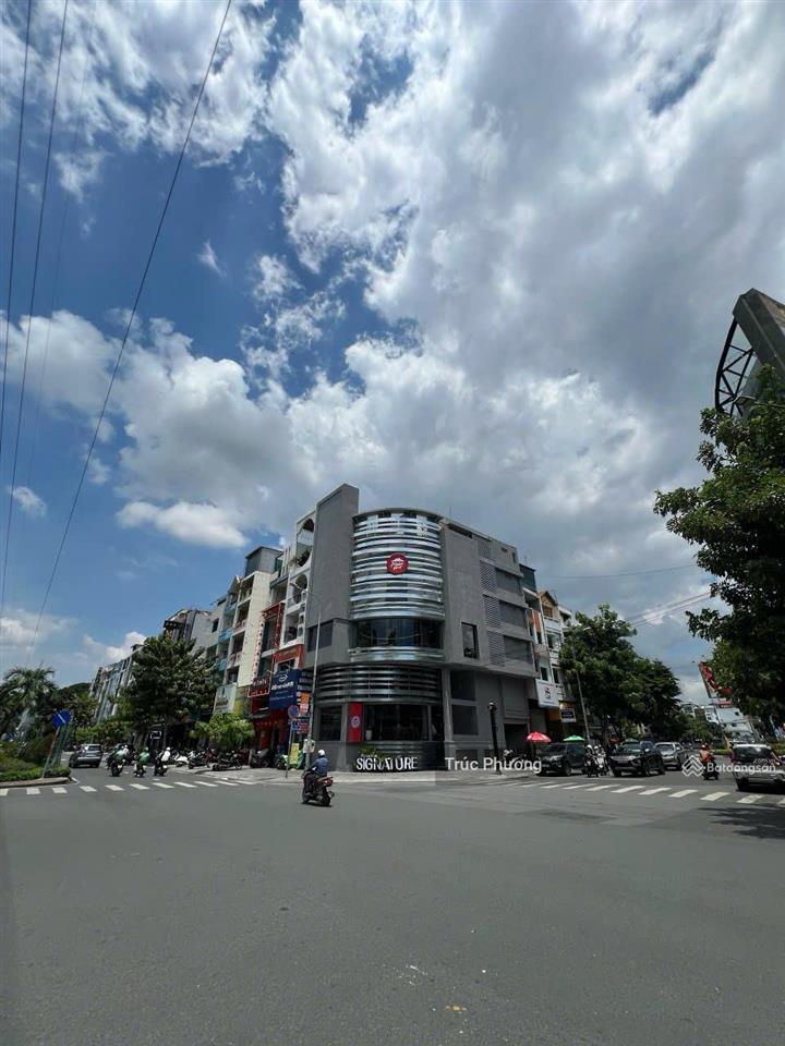 Góc 2 mặt tiền phan xích long  hoa lan, phú nhuận 128m2(8x16m) hầm + 6 tầng, hđt 7000$, giá 75 tỷ