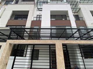 Cho thuê nhà mới 100% kđt hoàng thành mỗ lao. dt 150m2, 5 tầng, thang máy, điều hòa. ô tô đỗ cửa