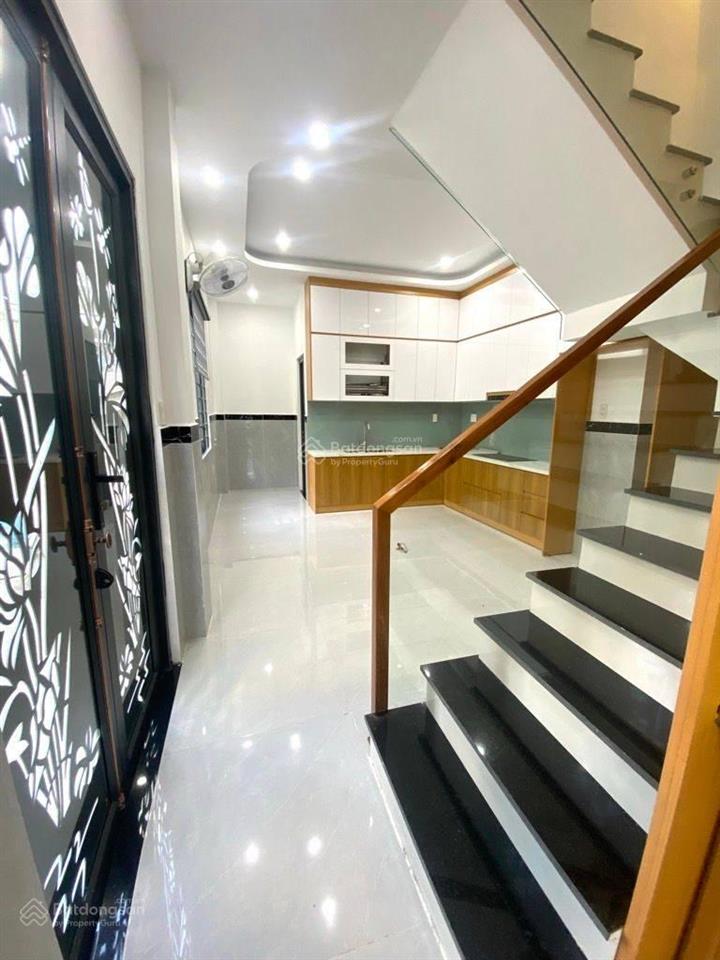 Nhà đẹp ở ngay căn góc thoáng mát sáng sủa ngay chợ tân trụ  tân bình  xh đổ cửa 58m2 2 tầng