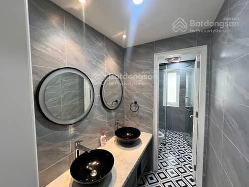 Tòa nhà mặt phố trường chính  đống đa  154m x 9 tầng  vừa ở vừa kd  sổ vuông nở hậu  119 tỷ