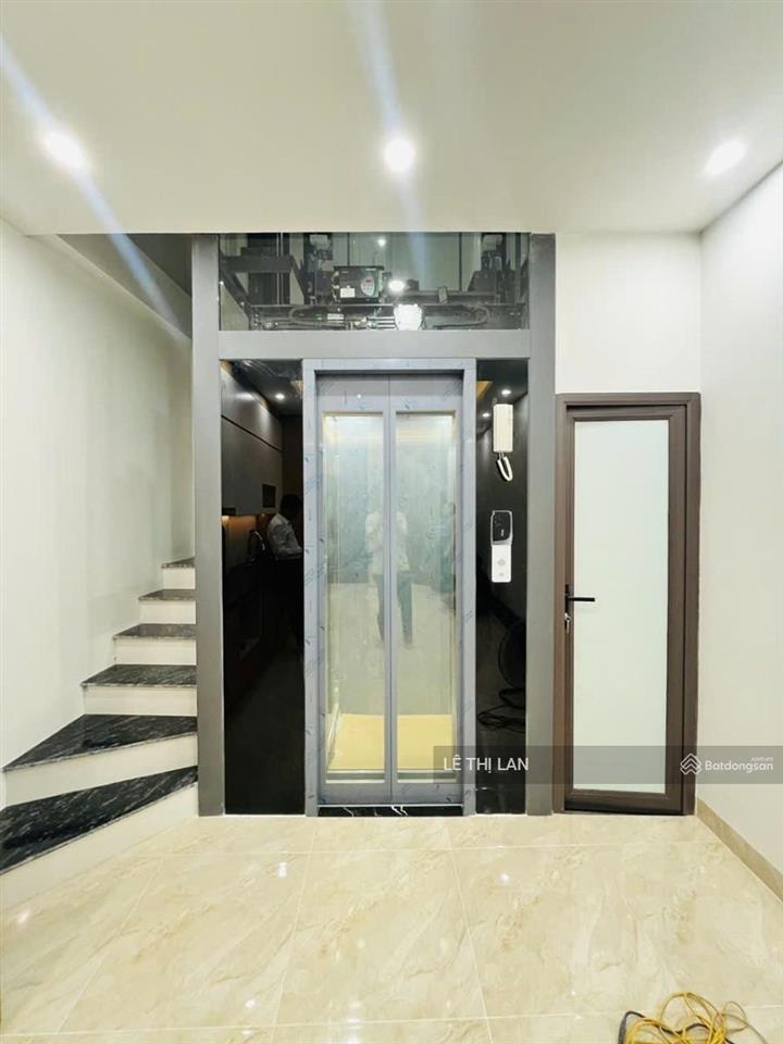 Khâm thiên 35 m2 x 6 tầng thang máy gồm 4 ngủ khép kín thoáng sáng gần phố ko quy hoạch