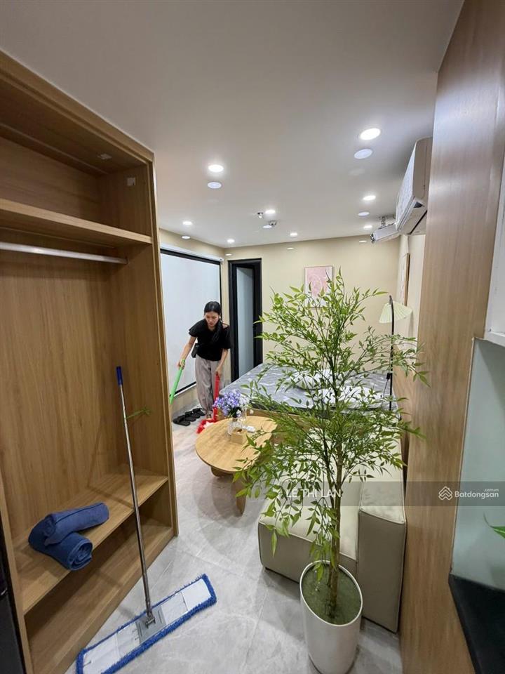 Nhỉnh 15 tỷ toà nhà dòng tiền 100tr/thang phố hào nam 60 m2 x7 tầng thang máy 17 phòng full xịn mới
