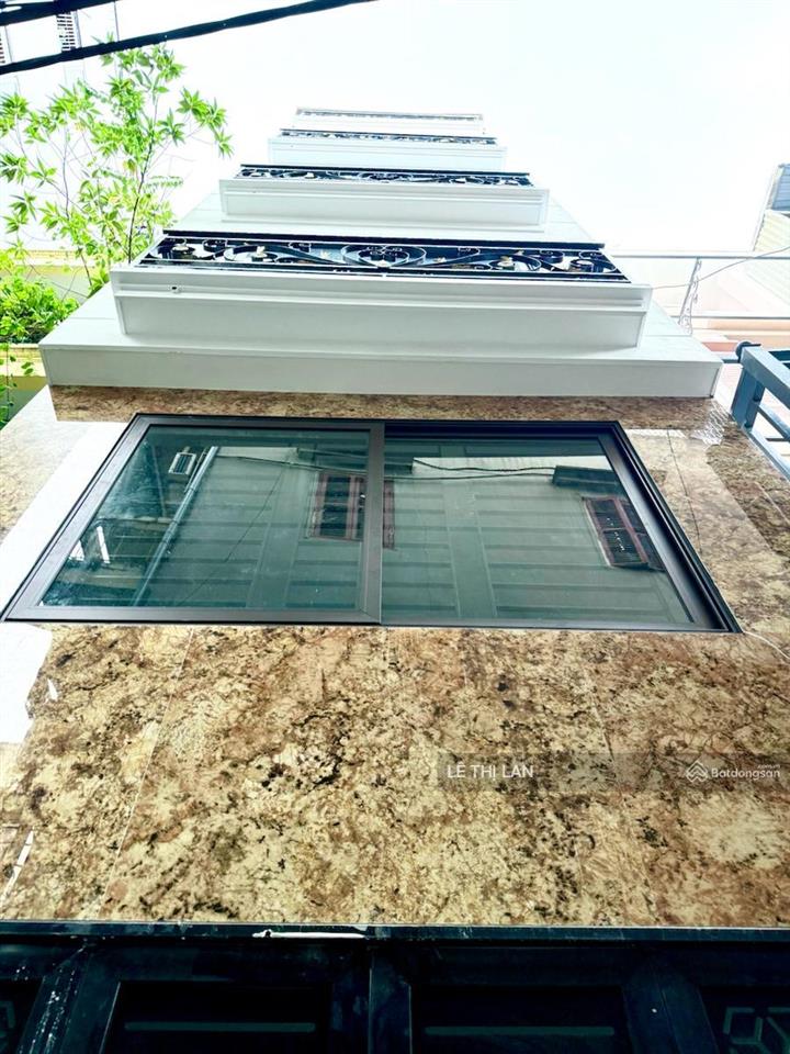 16 tỷ toà nhà dòng tiền phố đường láng 60m2 x 7tầng thang máy 12 phòng full dòng tiền 900 tr/năm