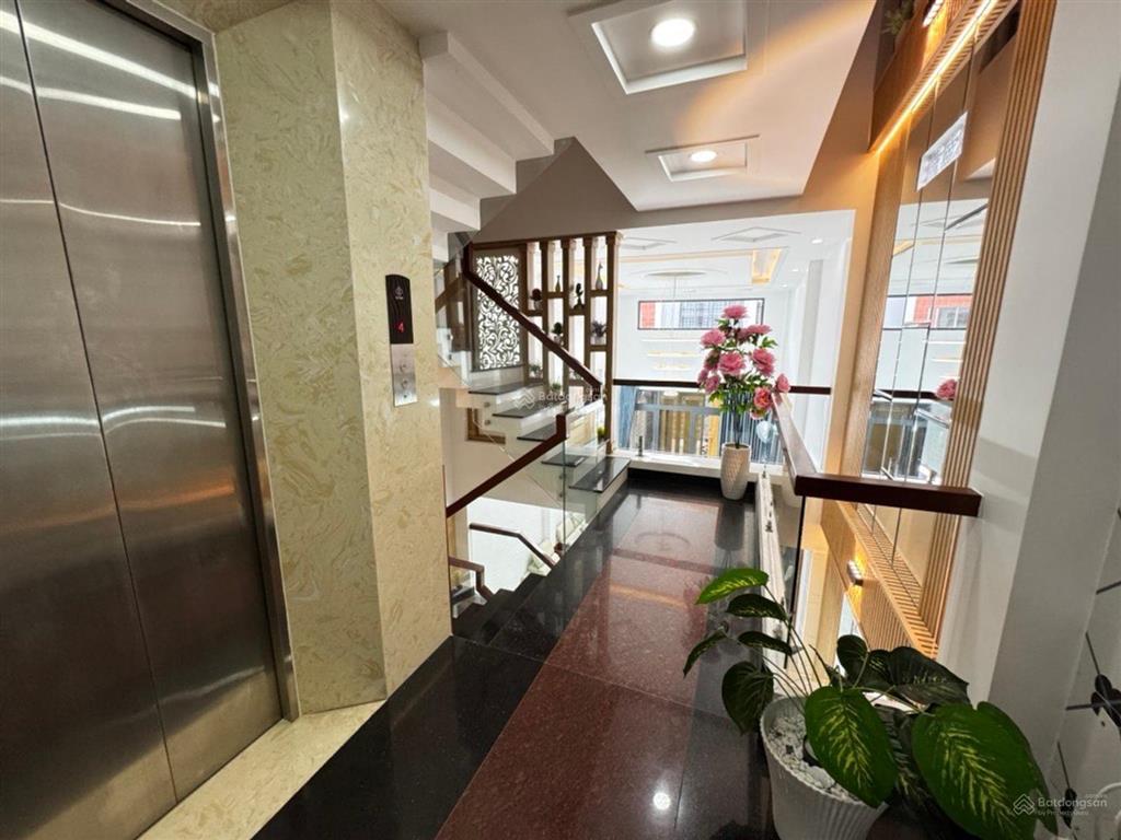 Bán nhà hẻm xe hơi nguyễn duy cung, cách mặt tiền 30m, 4*22 vuông cn 88m2, 5 tầng thang máy 450kg