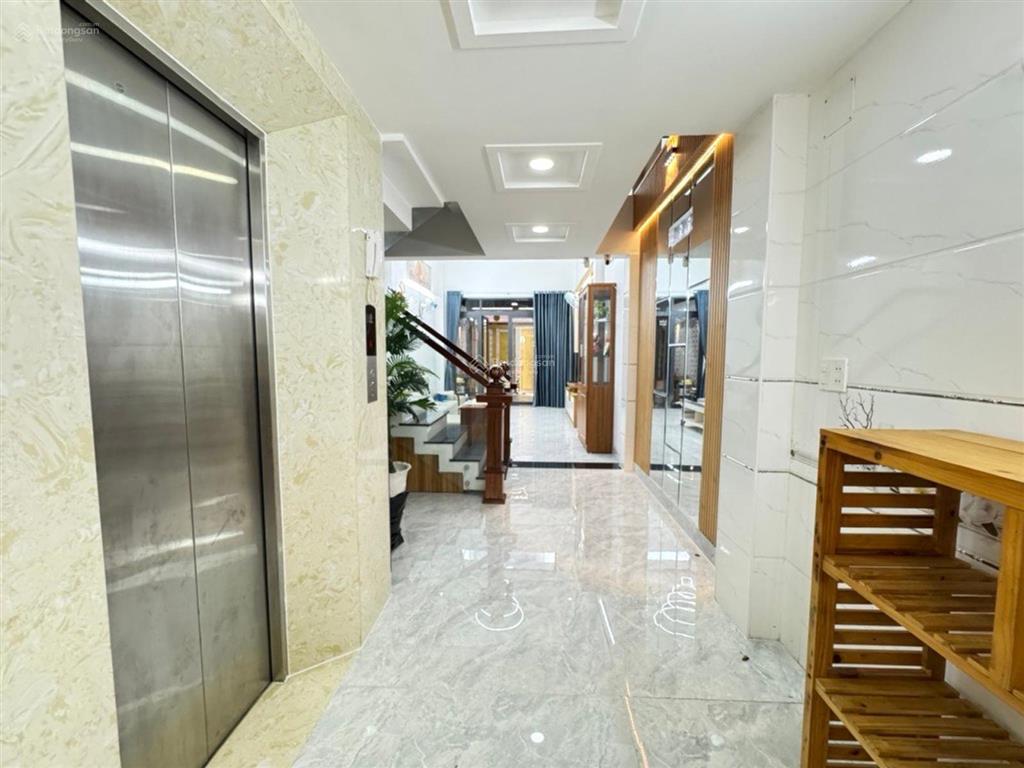 Bán nhà hẻm xe hơi nguyễn duy cung, cách mặt tiền 30m, 4*22 vuông cn 88m2, 5 tầng thang máy 450kg