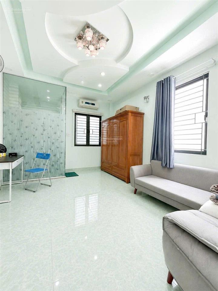 Ngã tư tân sơn nhì  sát mt, 4x20x4 tầng, xe hơi thẳng 1 trục. nhà đẹp ở ngay.
