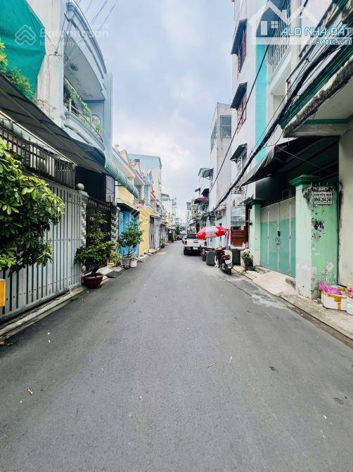 Chủ gấp bán nhà 2 mặt tiền, tân bình, trần thị trọng, 4 tầng, đường nhựa 5m, 4x14m, nhỉnh 9 tỷ