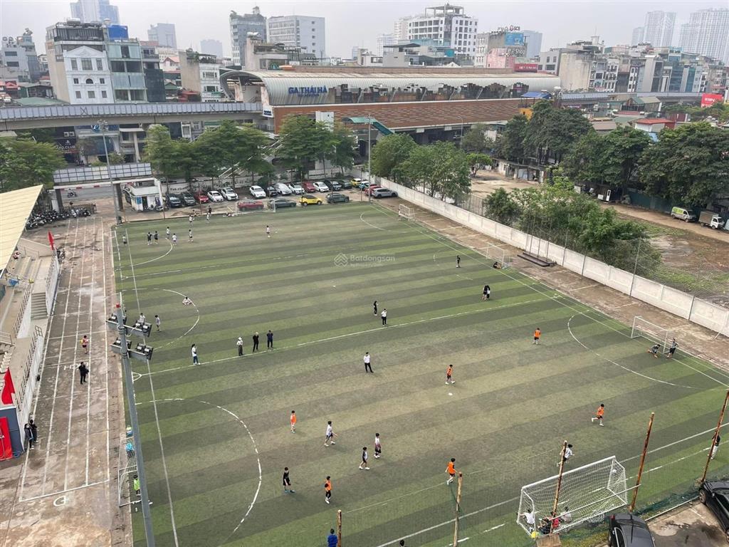 Building 10 tầng  mặt phố  lô góc 3 thoáng  view hồ hoàng cầu + sân bóng  đầy đủ pccc gpxd