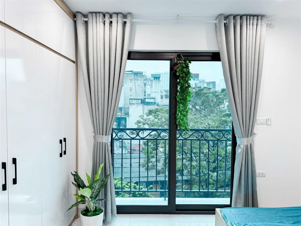 Bán tòa chdv trường chinh ngõ thông kd sát phố gần hv ngân hàng, sổ vuông 50m2*6t 9p kk, pccc đủ