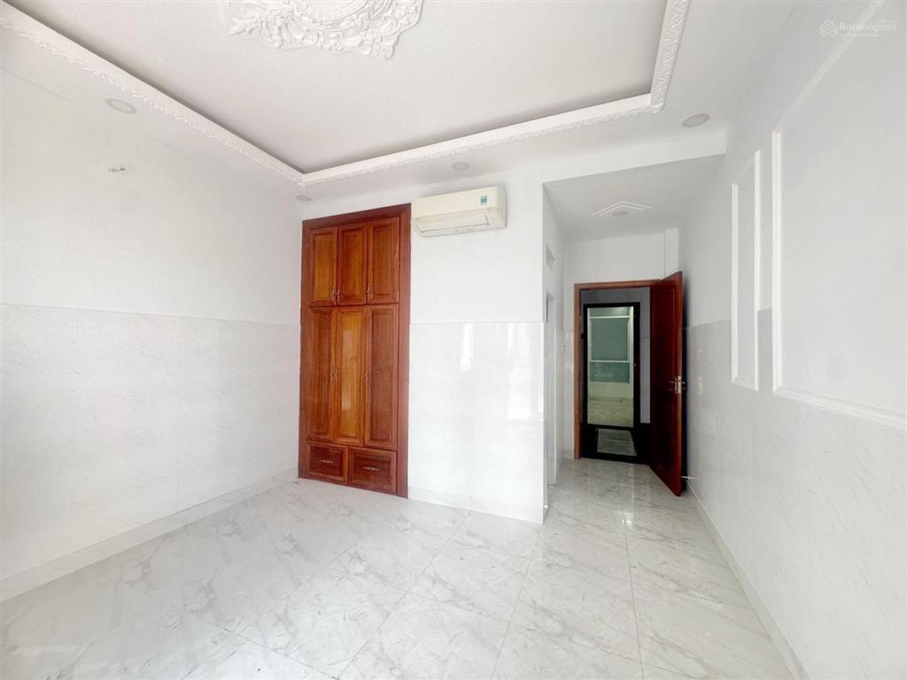 Bán nhà 4 tầng, 62m2(4x15,5m). hxh tới cửa đường lê đức thọ, phường an hội đông. chỉ 7tỷ2.