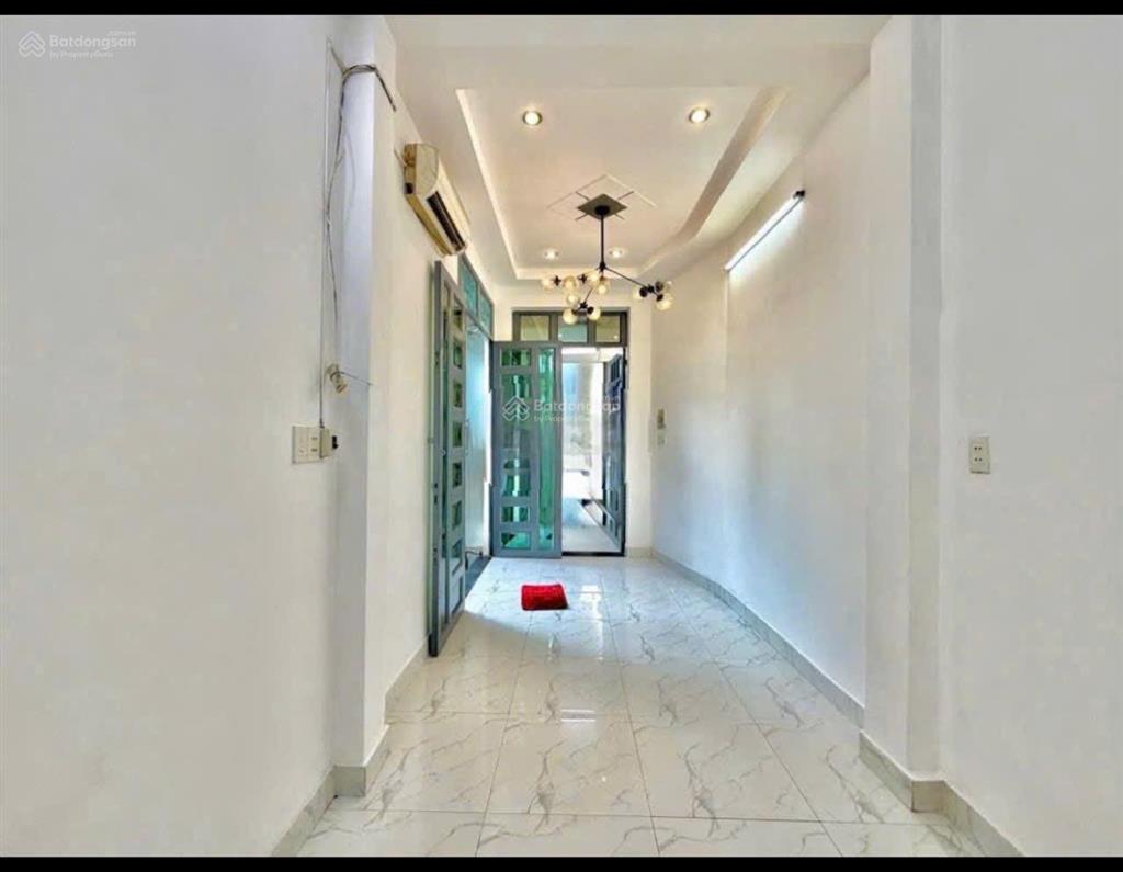 Nhà hxh  thích quảng đức  10x3m  trệt 3 lầu  3pn 3wc  13 triệu tl  hằng 0906 656 *** xem nhà