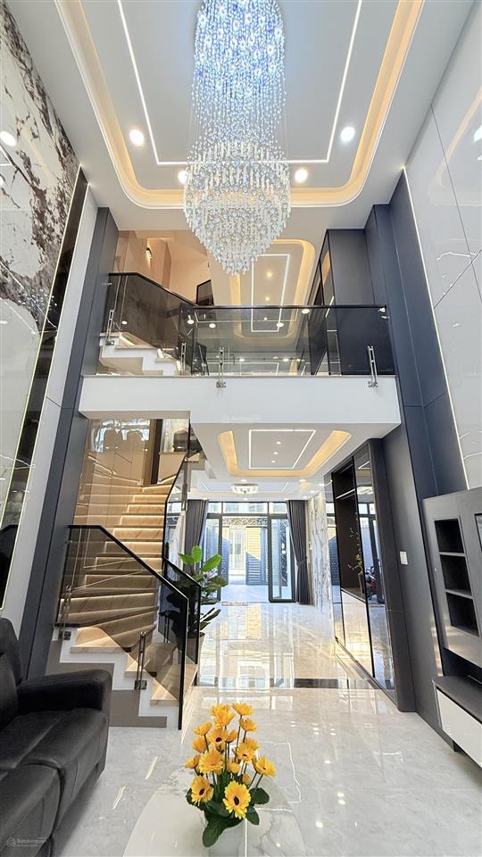 Nhà mới 4x19m. đường thạnh lộc 27 . ngay chung cư thạnh lộc. xây 1 lửng 3 lầu. sân xe hơi