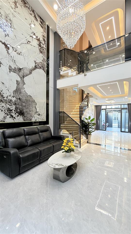 Nhà mới 4x19m. đường thạnh lộc 27 . ngay chung cư thạnh lộc. xây 1 lửng 3 lầu. sân xe hơi