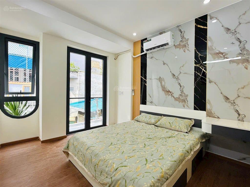 Nhà quận 12 mới xây đường nguyễn thị kiểu 4,5x10m sau lưng siêu thị mega mall shc 4 căn giá rẻ