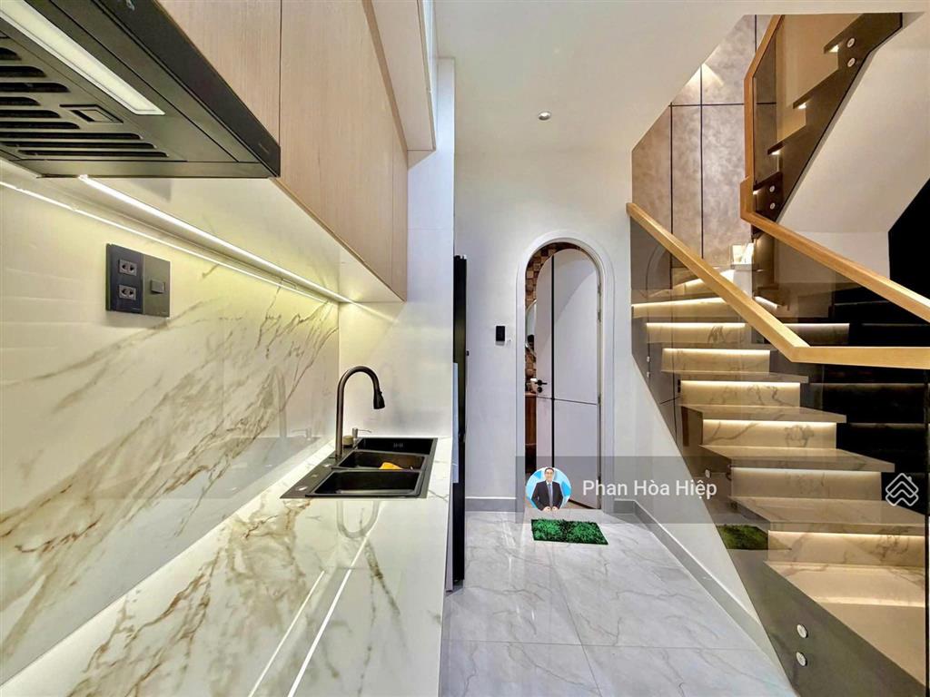 Nhà mới đẹp ngay chợ phú lâm, 70m2, 4 tầng btct,4 pn 5wc, hẻm thông xe hơi tới nhà,khu dân trí cao