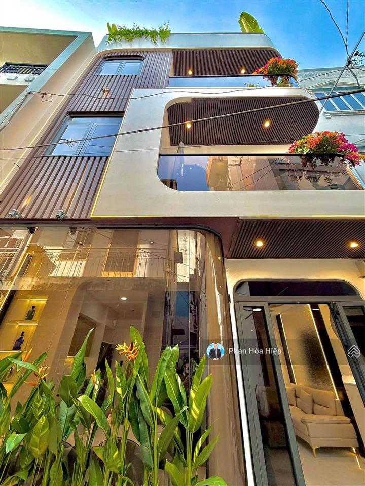 Nhà mới đẹp ngay chợ phú lâm, 70m2, 4 tầng btct,4 pn 5wc, hẻm thông xe hơi tới nhà,khu dân trí cao