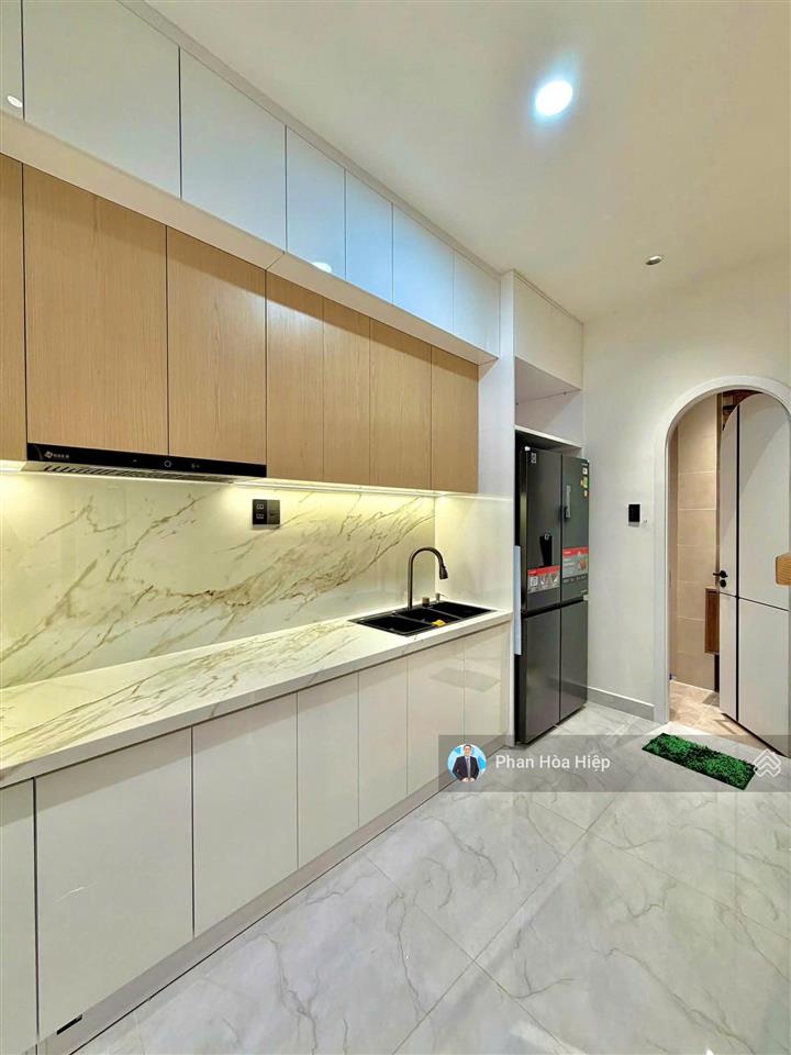 Nhà mới đẹp ngay chợ phú lâm, 70m2, 4 tầng btct,4 pn 5wc, hẻm thông xe hơi tới nhà,khu dân trí cao