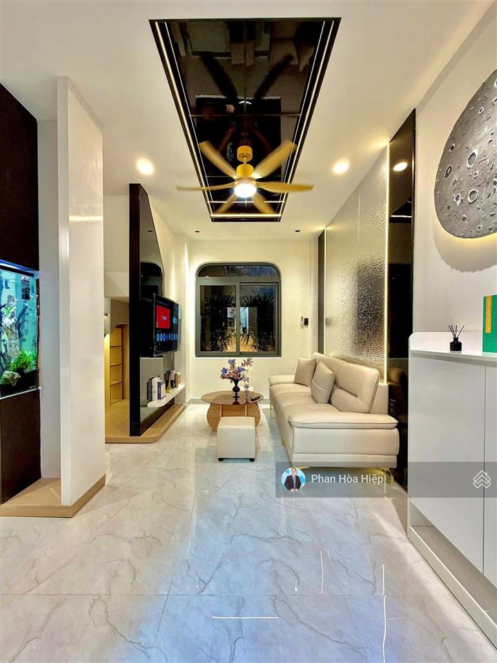 Nhà mới đẹp ngay chợ phú lâm, 70m2, 4 tầng btct,4 pn 5wc, hẻm thông xe hơi tới nhà,khu dân trí cao
