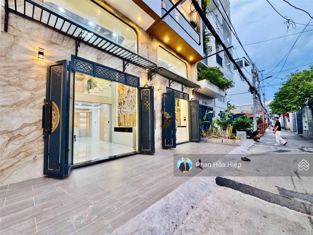 Nhà mới ngay an dương vương, 60m2, 5 tầng đúc, 4pn hẻm rộng 8m, gần cv phú lâm, tiện kinh doanh