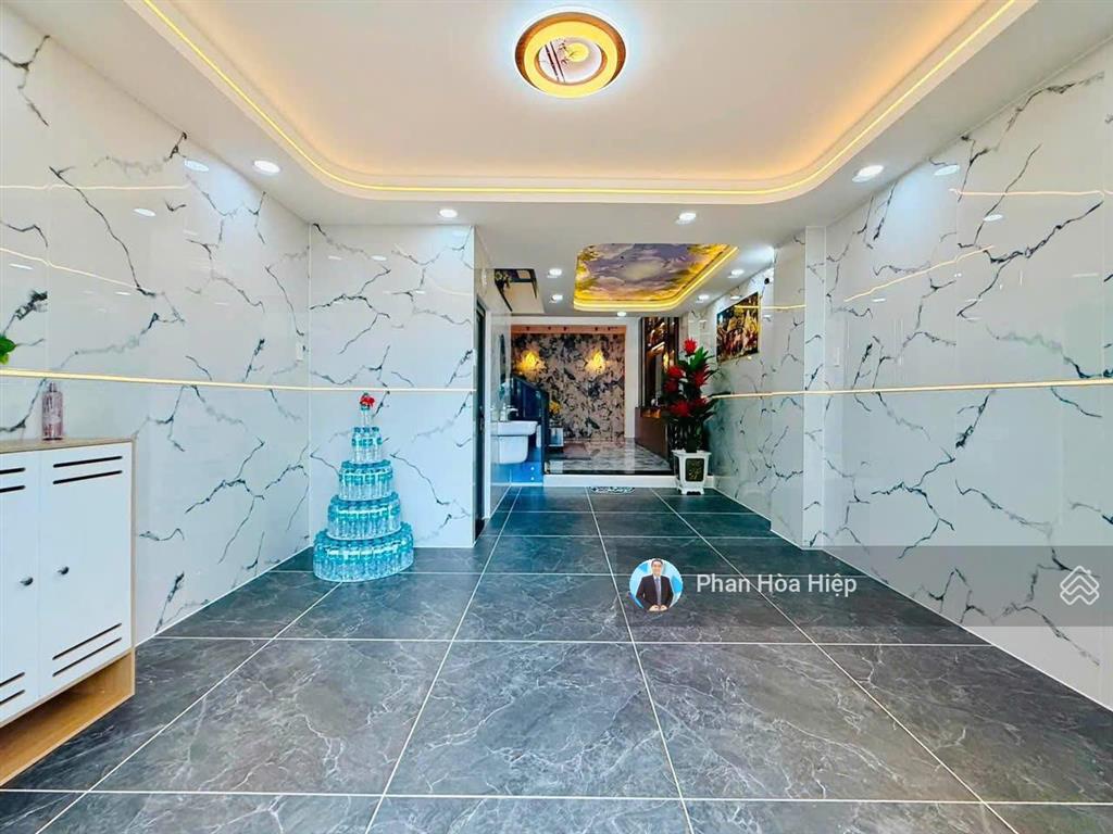 Nhà gần chợ phú lâm, 64m2, 5 tầng btct, 5pn 6wc, hẻm rộng gần ub phường phú lâm, sổ riêng